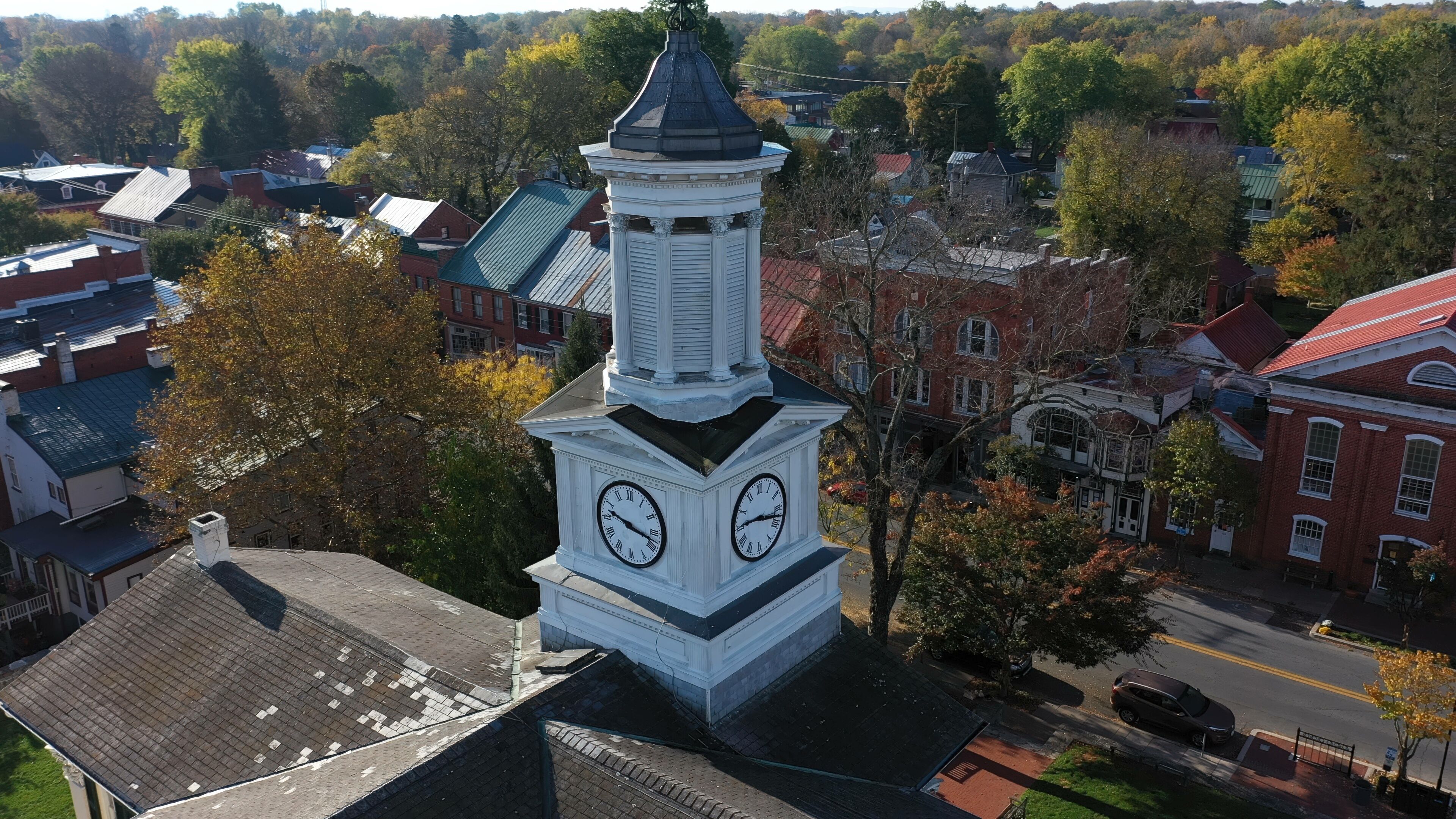 Closeup aerial camera orbiting around McMurrin Hall in Shepherdstown, WV on an autumn morning.