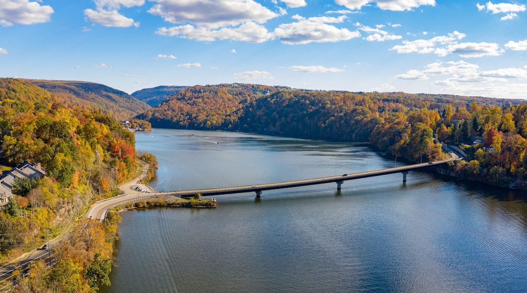 Aerial drone panorama of the autumn fall colors surrounding Cheat Lake and the Old Cheat Road bridge near Morgantown, West Virginia