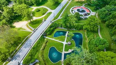 Aerial View of Huntington Memorial Park with Ponds and Monument