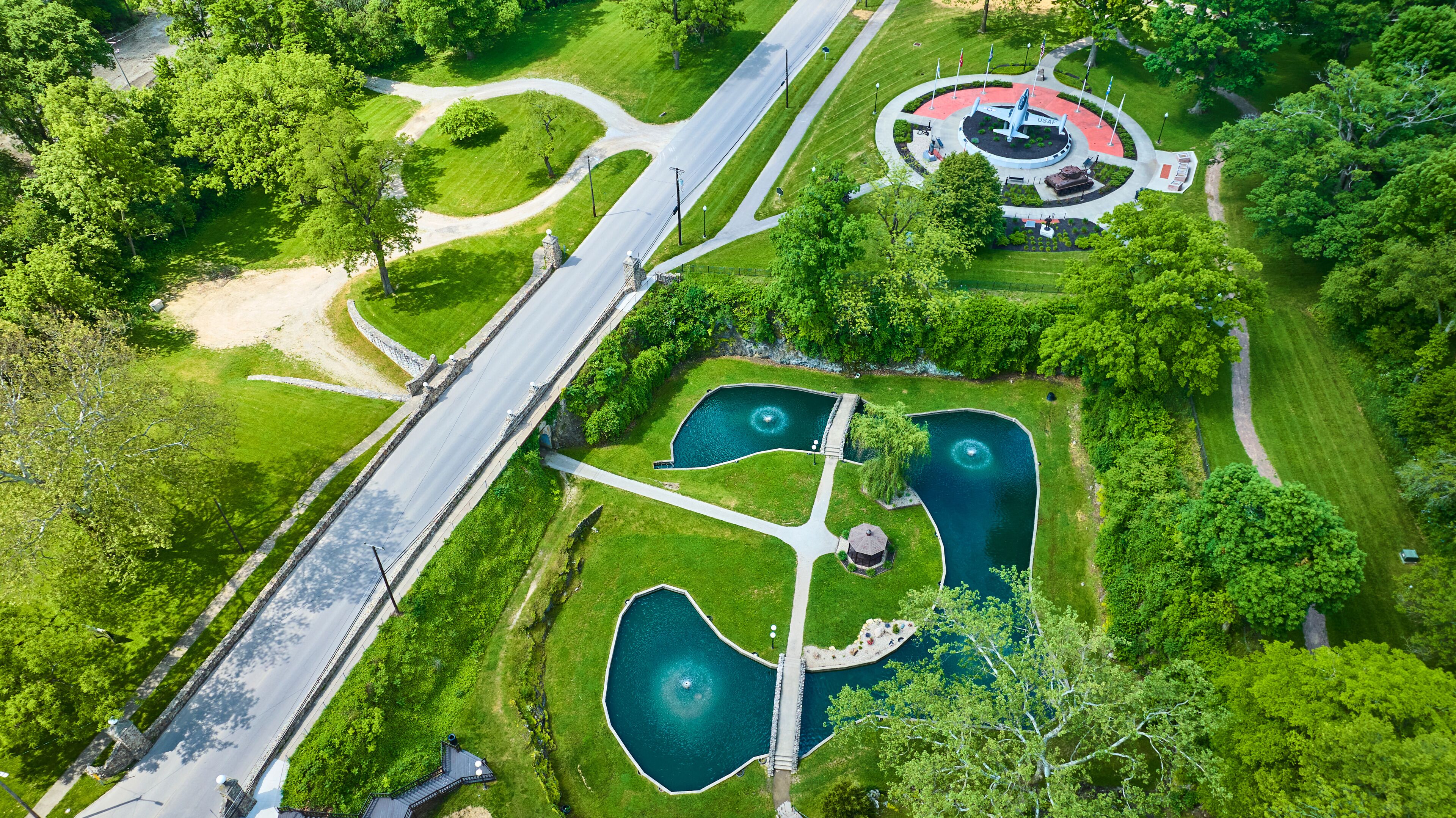 Aerial View of Huntington Memorial Park with Ponds and Monument