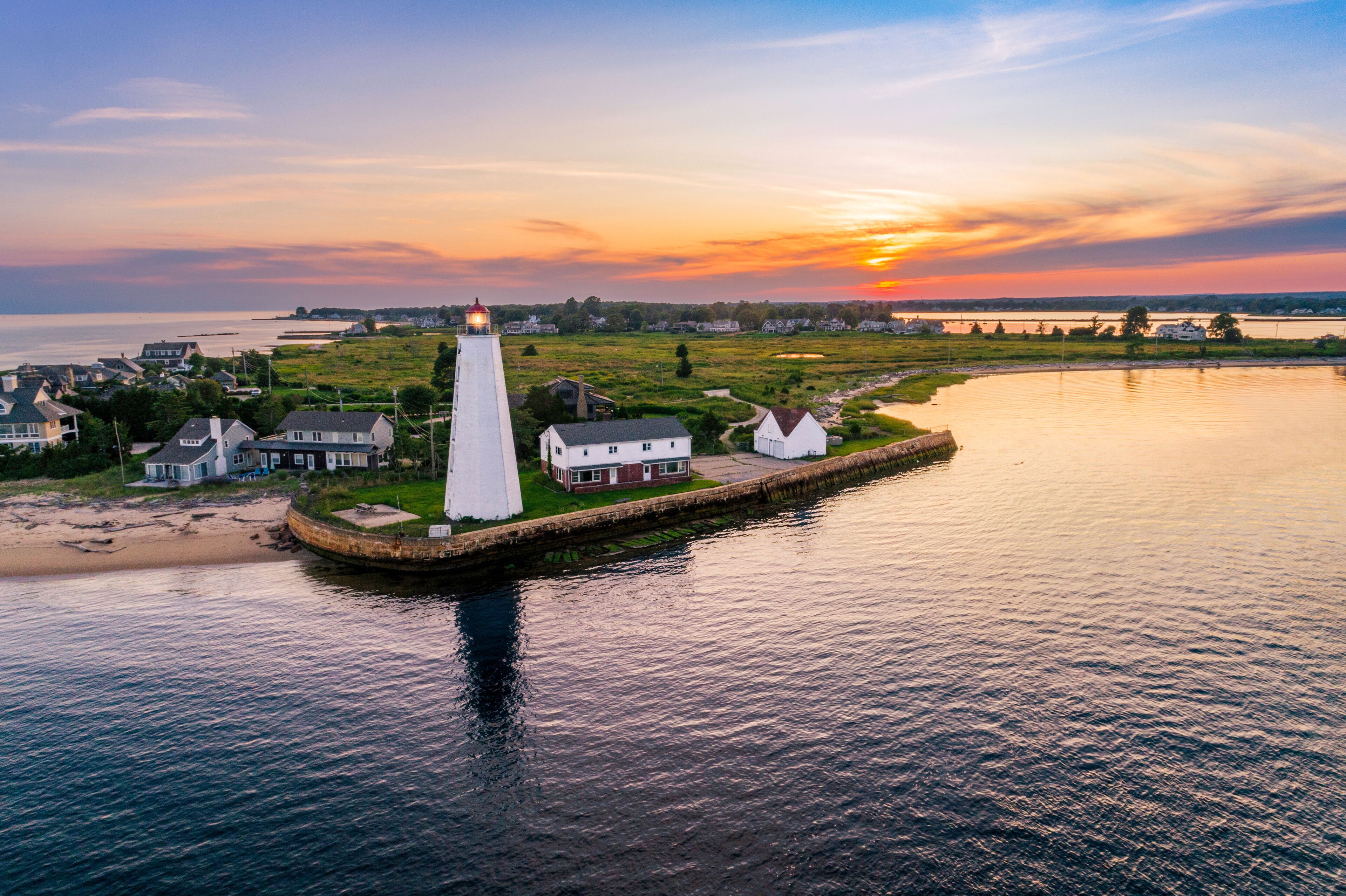 Lynde Point Lighthouse (also known as the Inner Light) and the keeper's house stand at the mouth of the Connecticut River, where it meets Long Island Sound in Old Saybrook, Connecticut, New England