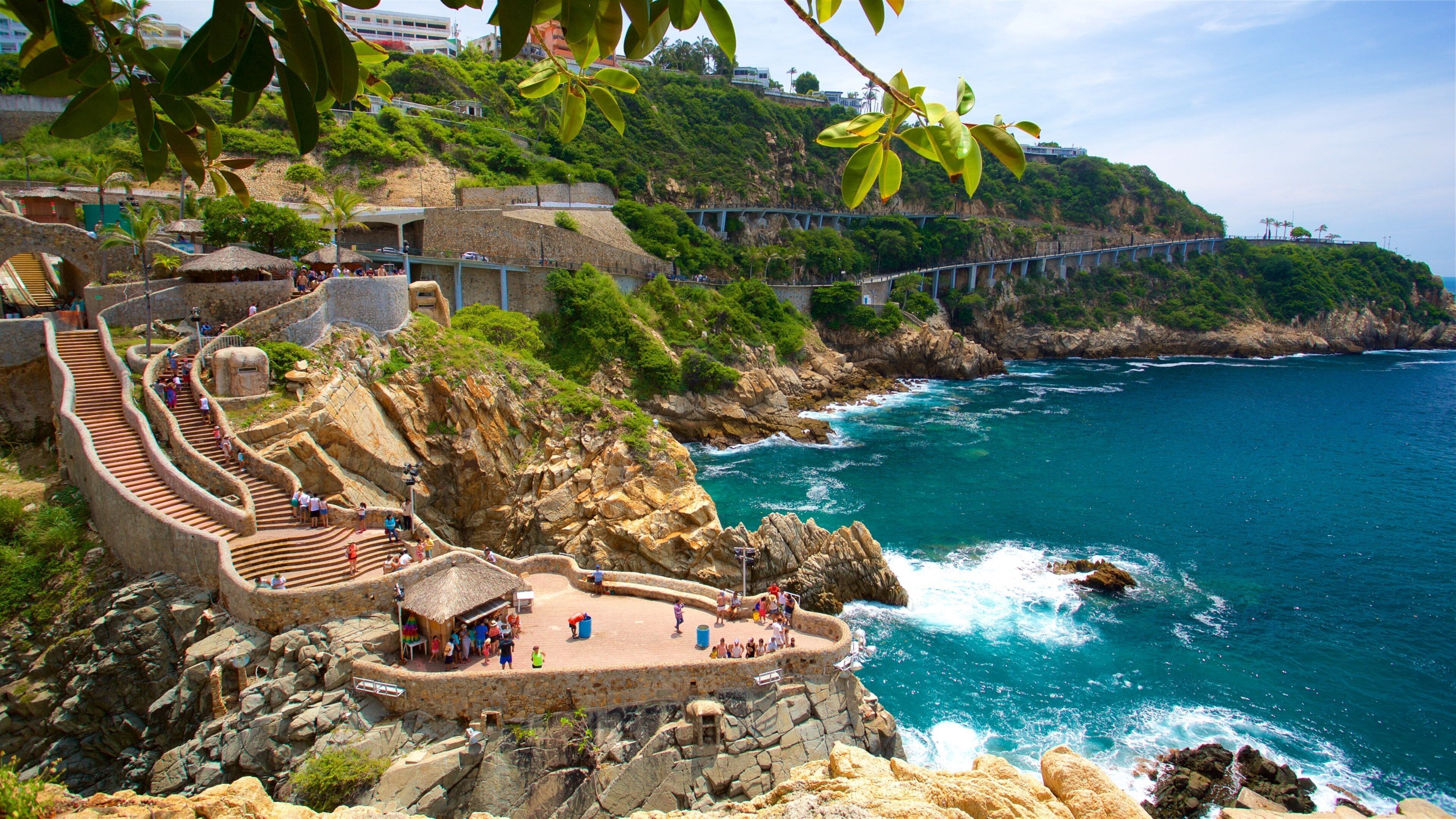 Acapulco which includes rugged coastline