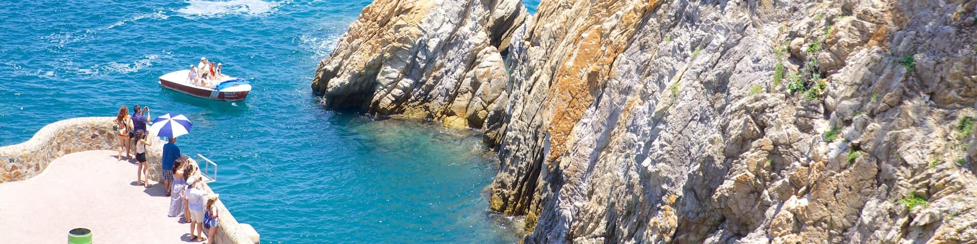 La Quebrada Cliffs featuring a gorge or canyon, rocky coastline and views