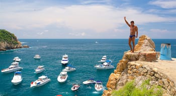La Quebrada Cliffs featuring boating and a bay or harbor as well as an individual male