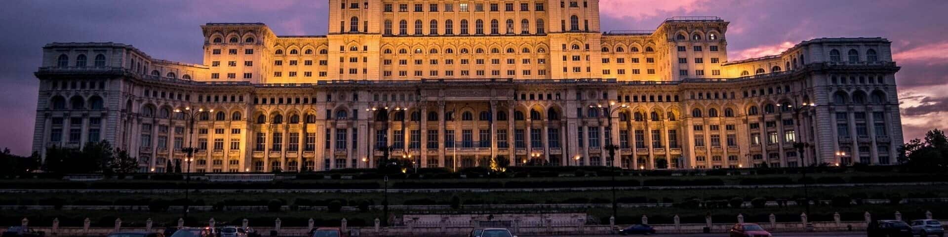 The imposing Palace of the Parliament at sunset. Both its interior and exterior are stunning.
