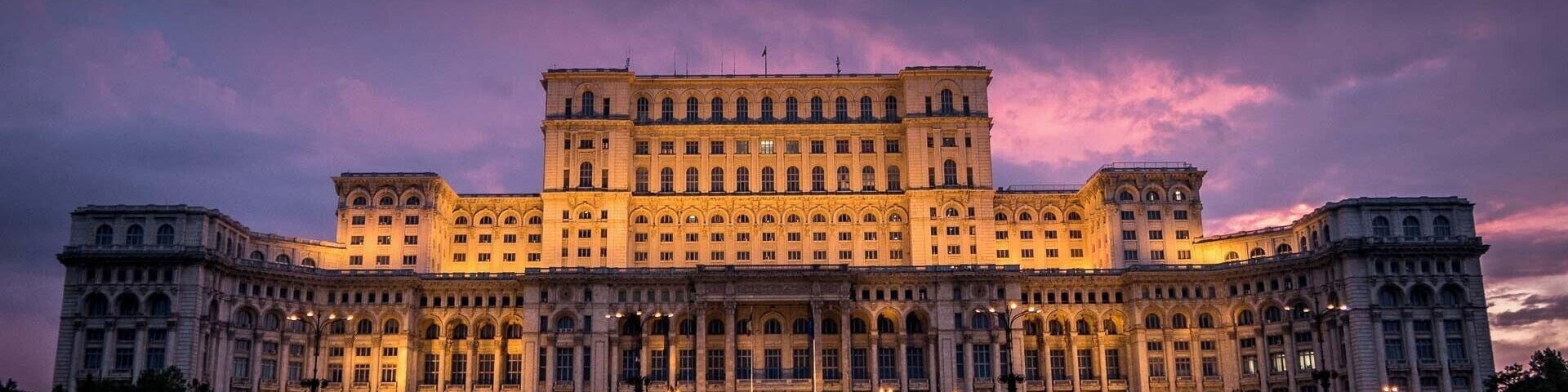 The imposing Palace of the Parliament at sunset. Both its interior and exterior are stunning.