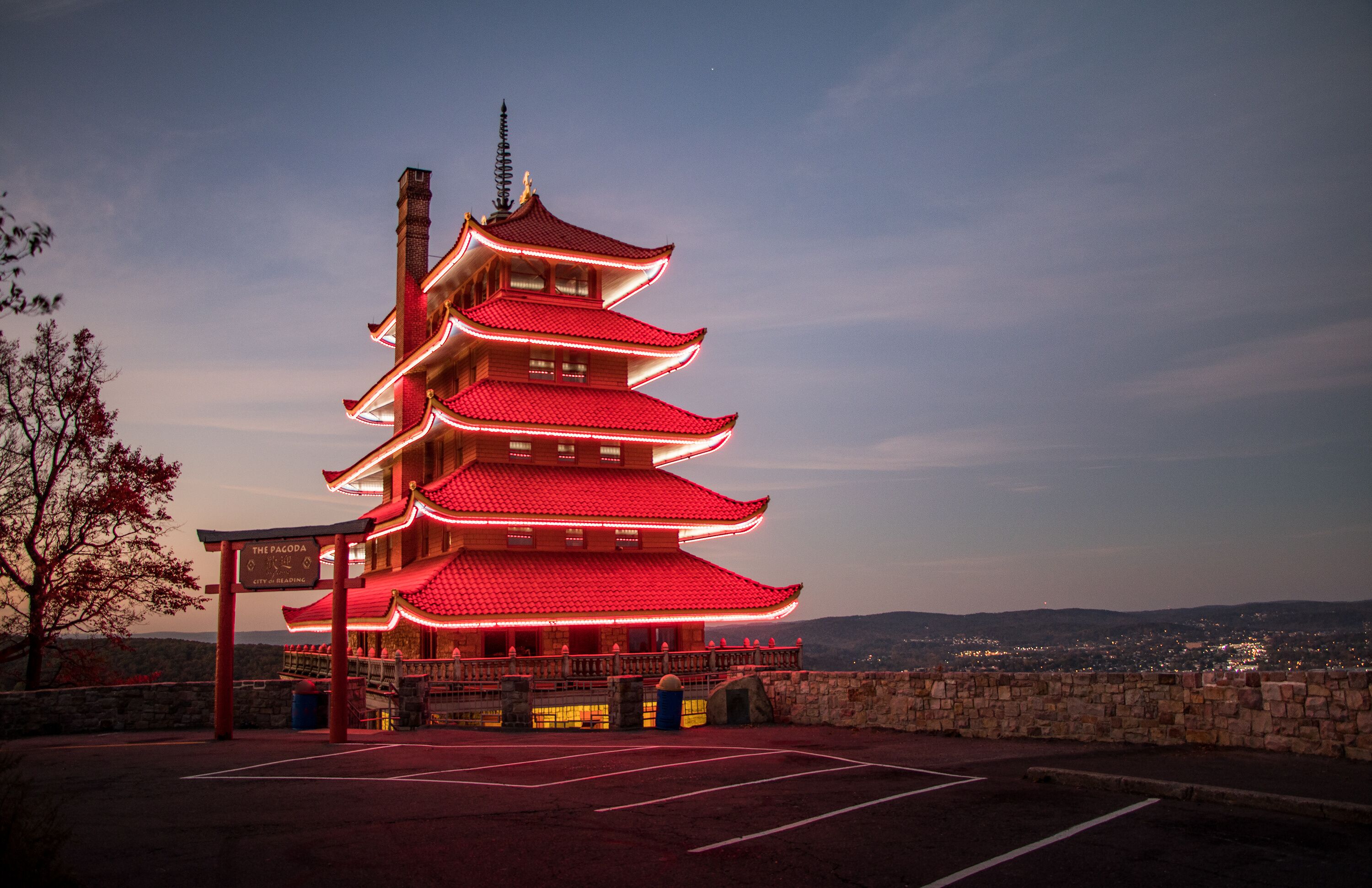 Reading Pagoda glows red with lights on in the pre-dawn light