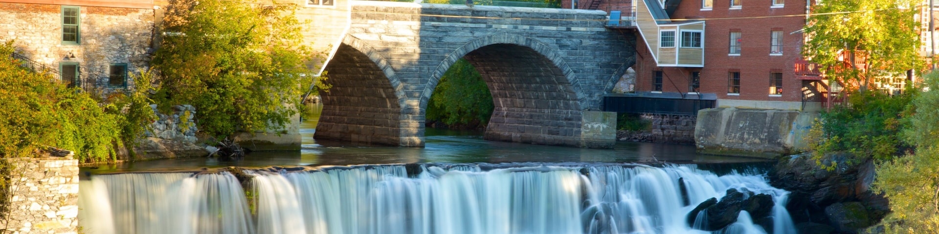 Northern Vermont featuring a river or creek, a bridge and a cascade