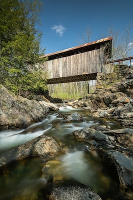 Straight out of Sleepy Hollow! Gold Brook Covered bridge. The best angle is from the other side of the river bank from where you park. You can get all the river in the image.