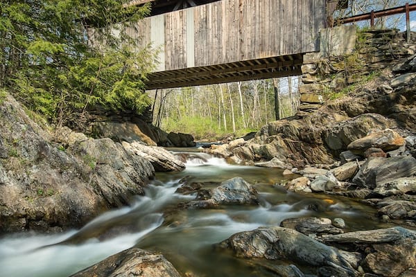 Straight out of Sleepy Hollow! Gold Brook Covered bridge. The best angle is from the other side of the river bank from where you park. You can get all the river in the image.