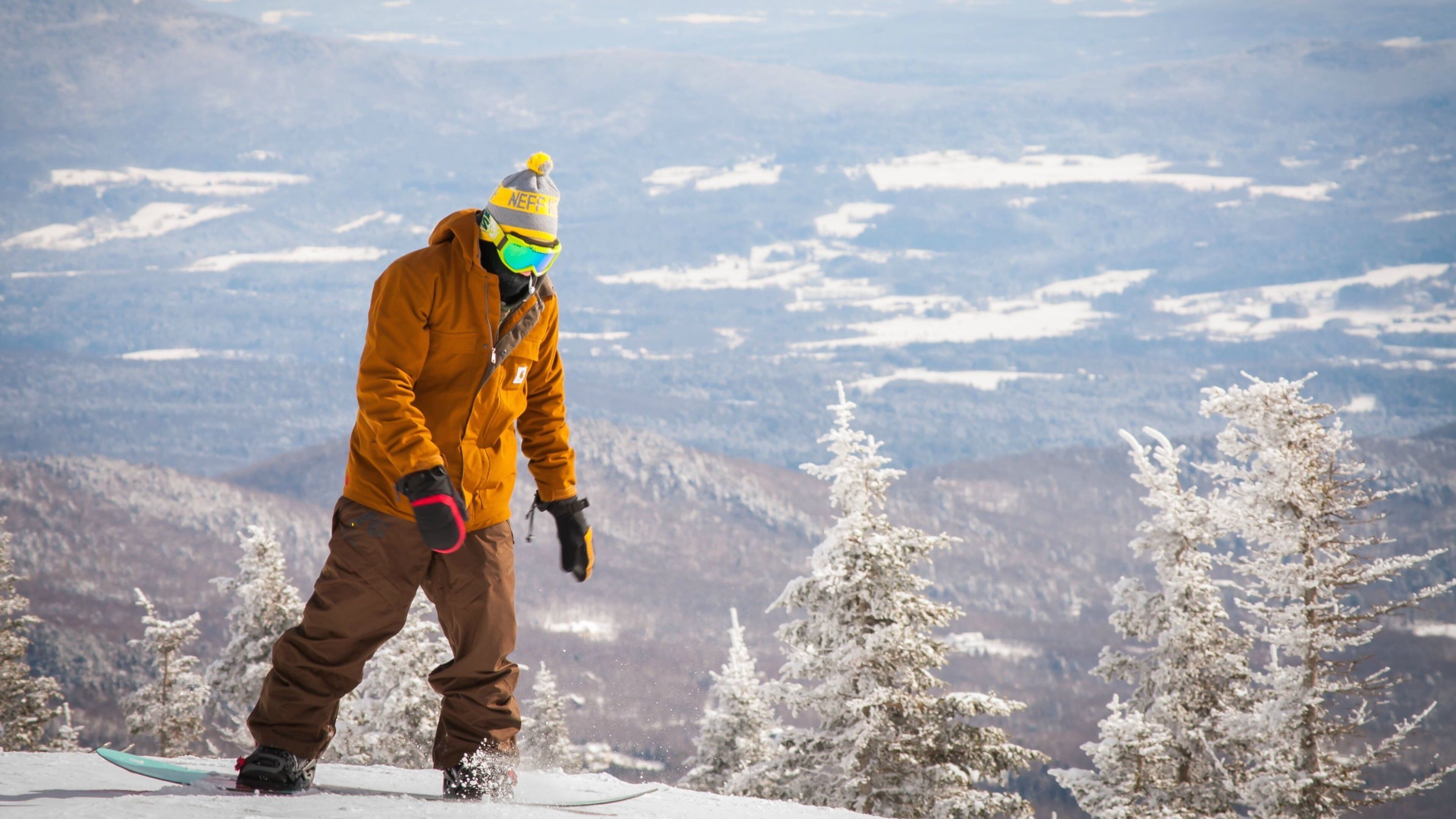 Stowe which includes snow boarding and snow as well as an individual male