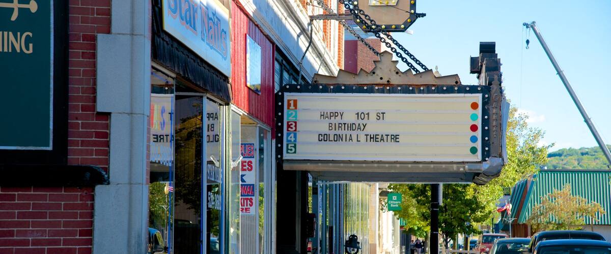 Laconia featuring street scenes and a city