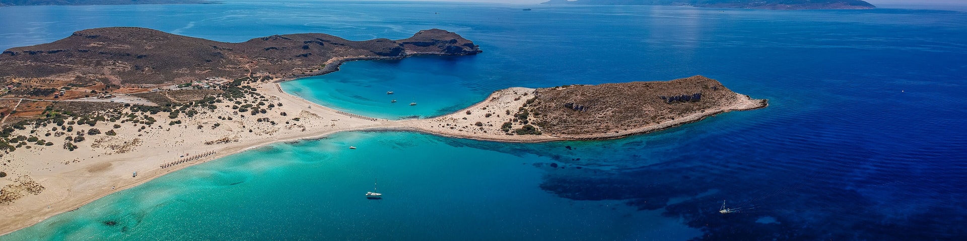 Aerial view of Simos beach in Elafonisos island in Greece. Elafonisos is a small Greek island the Peloponnese with idyllic exotic beaches and crystal clear waters. Laconia, Greece, Europe