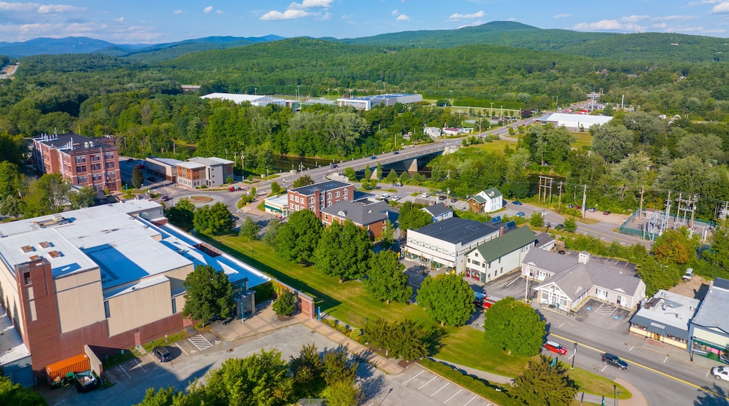 Main Street aerial view with White Mountain National Forest at the background in summer in town of Plymouth, New Hampshire NH, USA.