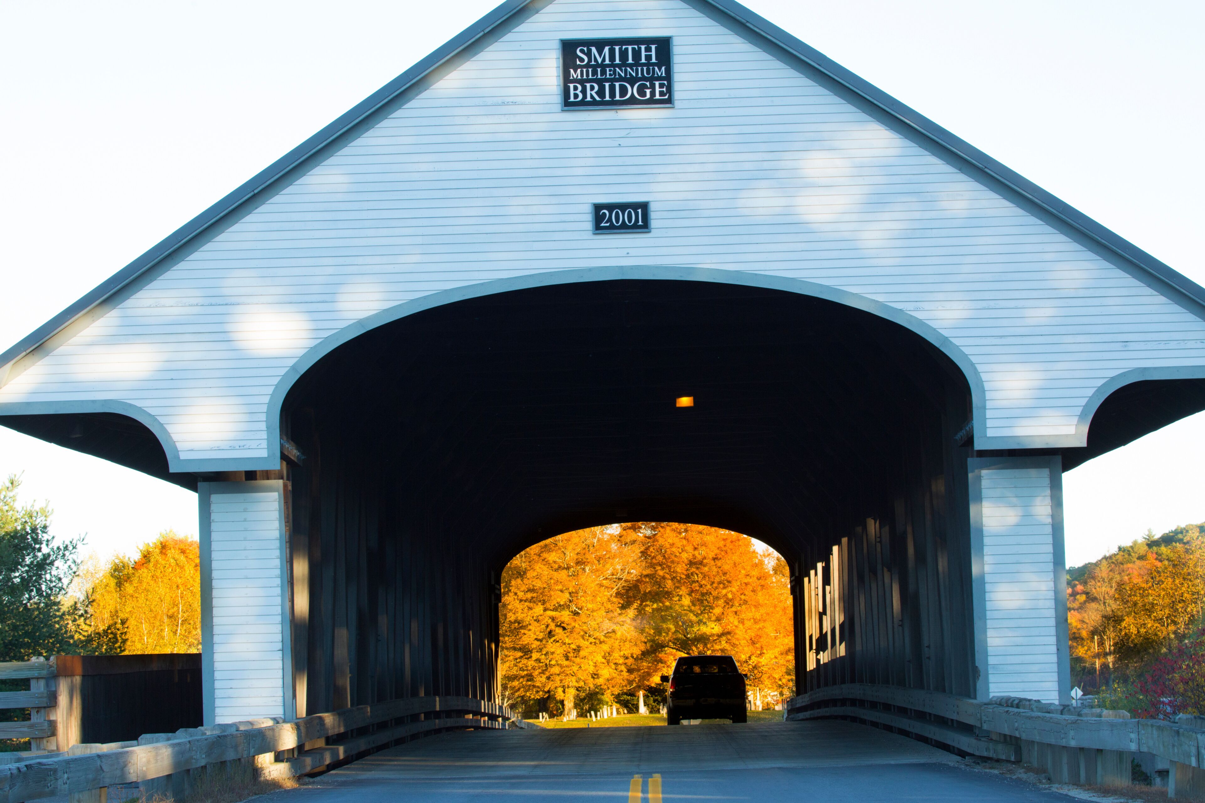Fall foliage and covered bridge, Plymouth, New Hampshire.