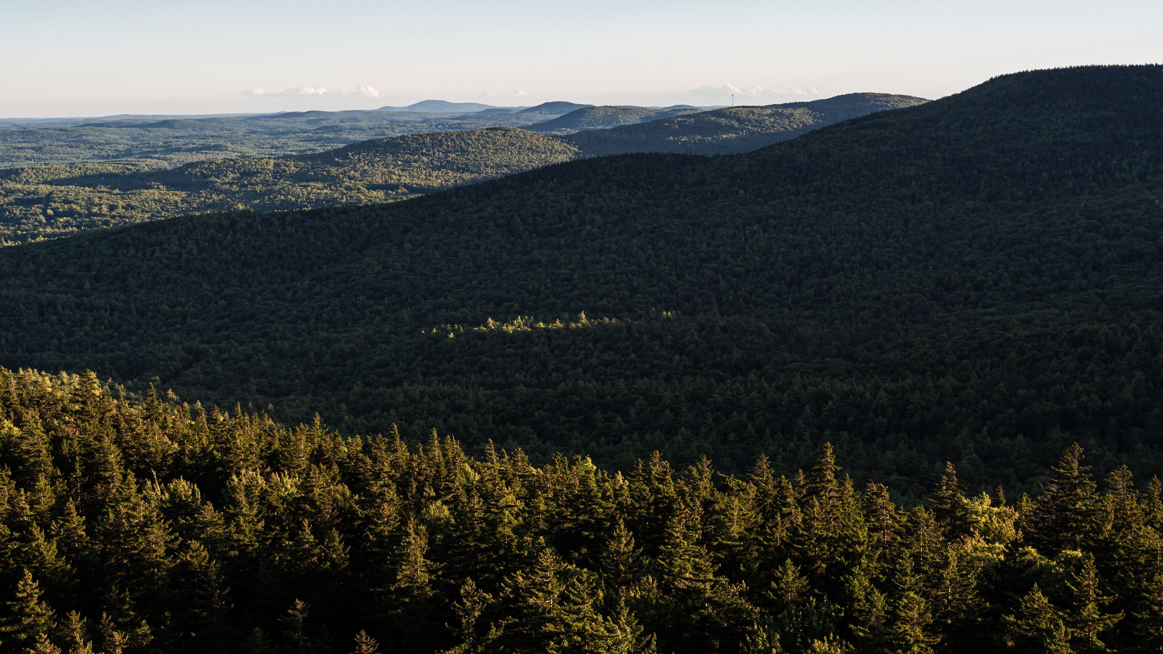 Standing on the cliff edge on North Pack Monadnock looking south over the Wapack Range in southern New Hampshire