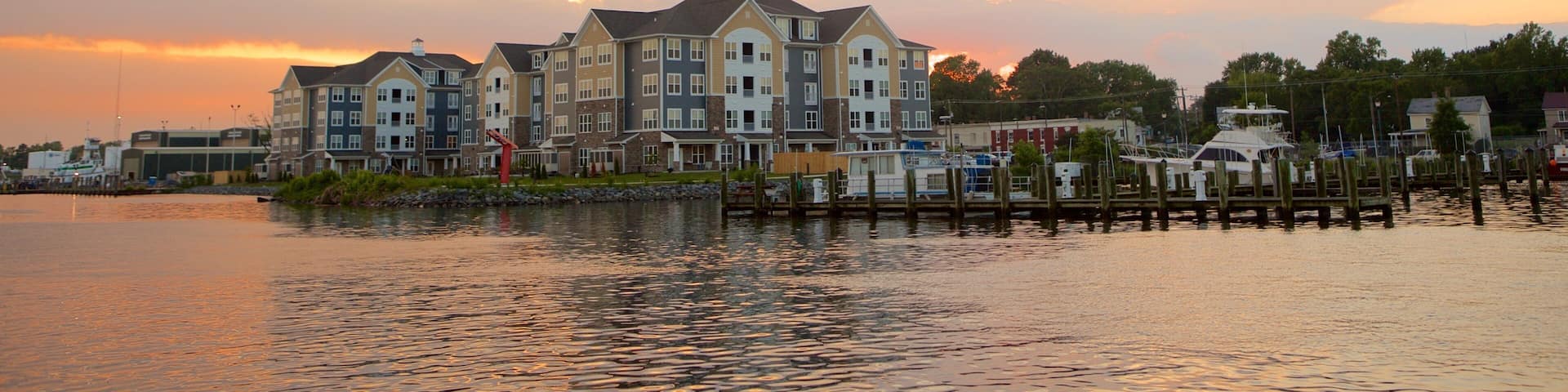 Salisbury which includes a sunset, a marina and a bay or harbor