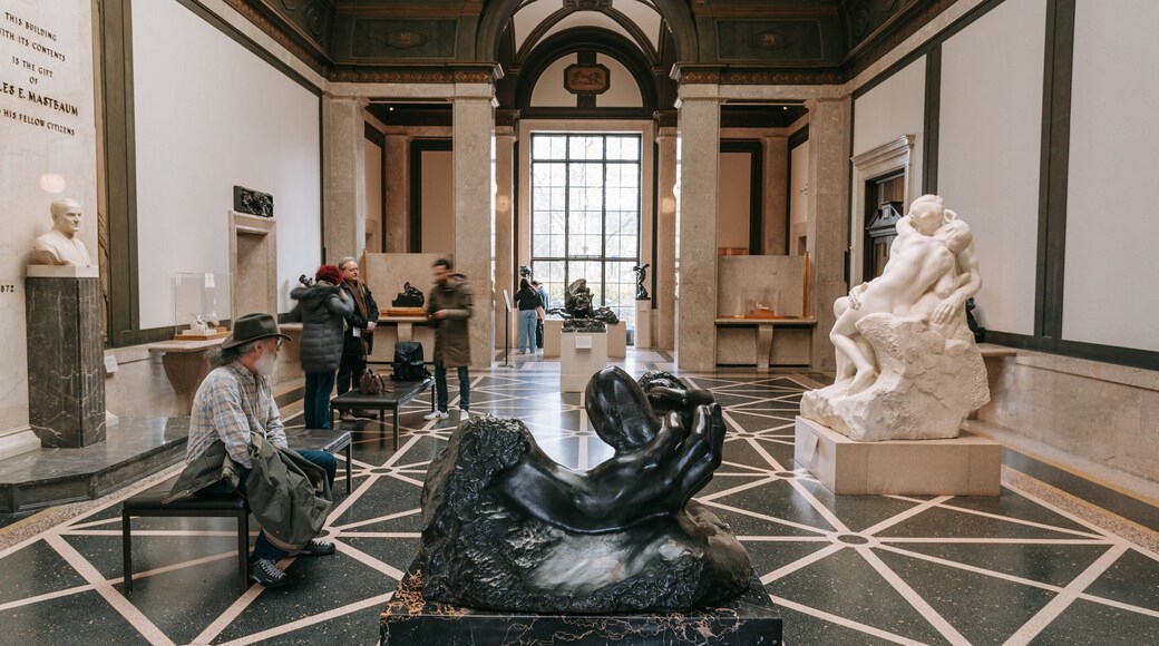 Center City which includes a statue or sculpture and interior views