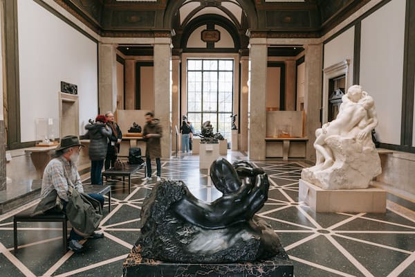 Center City which includes a statue or sculpture and interior views