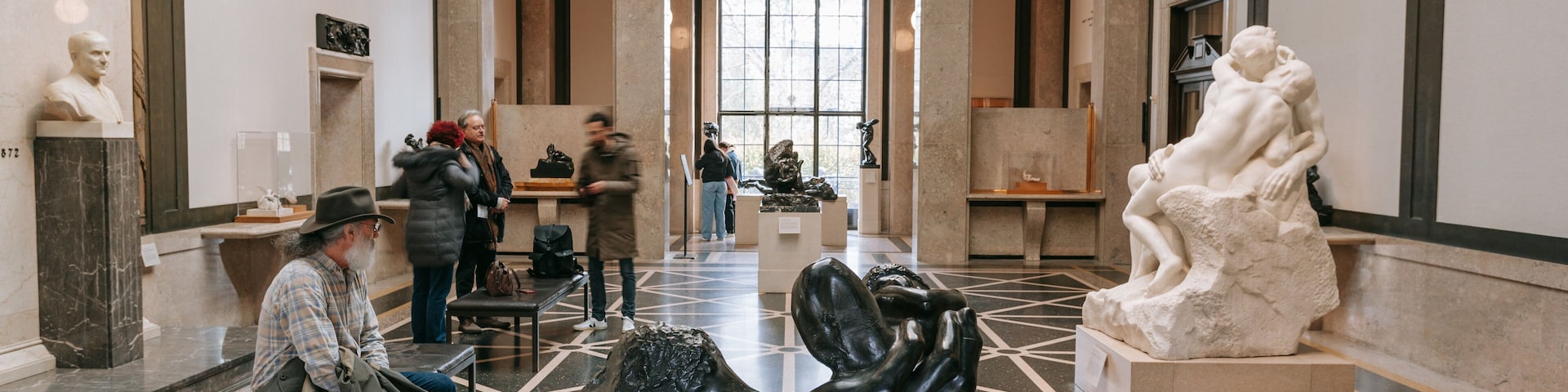 Center City which includes a statue or sculpture and interior views