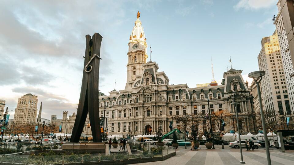 A historic building with ornate architecture and a tall tower.