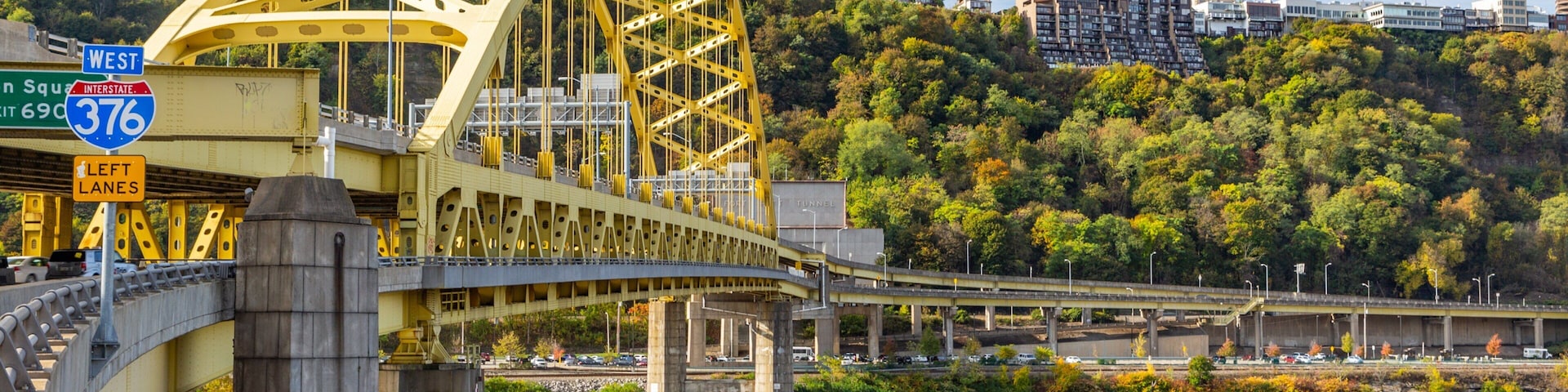 Downtown Pittsburgh which includes a bridge and a river or creek