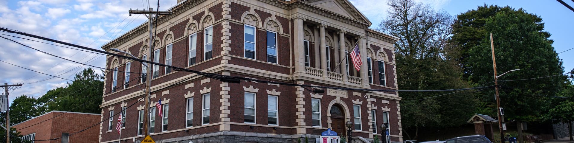 Town Hall of Irvington, NY exterior on a blue sky day
