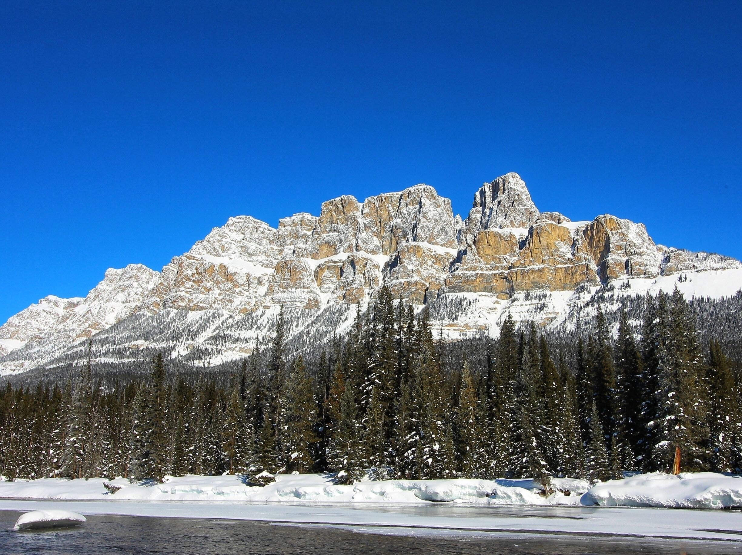 Just over the Bow River from the Castle Mountain Chalets,  there is this fantastic view of Castle Mountain. Snowy mountains on cold clear skies are the best!