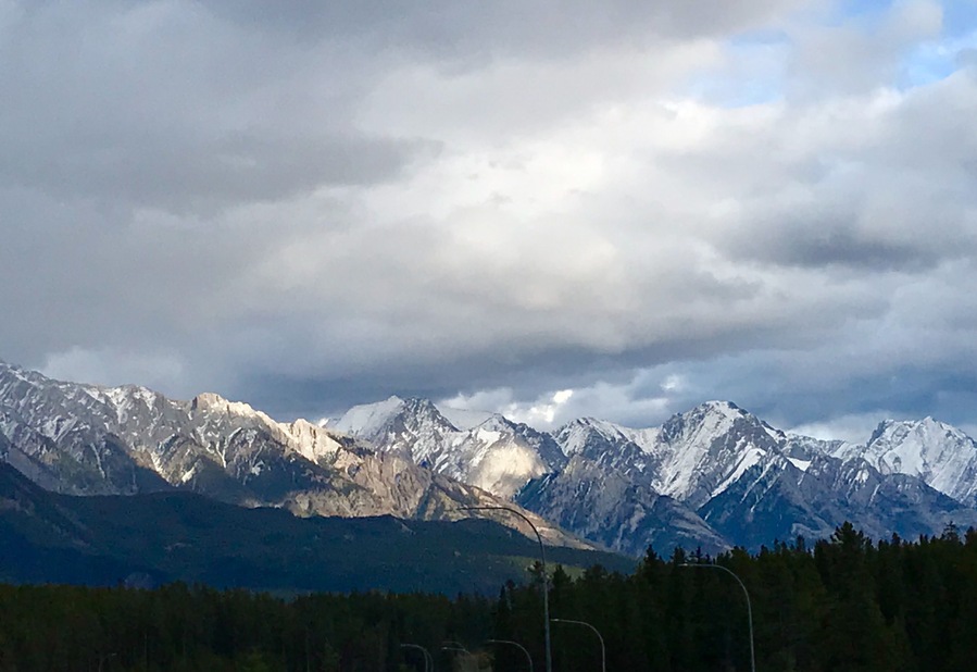 Heading eastbound on TransCanada 1 just before Banff, I was stuck by the beauty of the afternoon sun lighting up the mountains. I pulled off at the Hwy 93 exit and climbed up a rickety billboard scaffold (not recommended) to capture this shot.