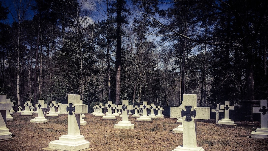 Final resting place for Brother Joseph, who created the art that is known as Ave Maria Grotto.This is a cemetery of only monks in residence at St. Bernard Abbey.
Ave Maria Grotto, in Cullman, Alabama, is a landscaped, 4-acre park in an old quarry on the grounds of St. Bernard Abbey, providing a garden setting for 125 miniature reproductions of some of the most famous religious structures of the world. It was added to the Alabama Register of Landmarks and Heritage on February 24, 1976, and to the National Register of Historic Places on January 19, 1984.
The stone and concrete models are the work of Brother Joseph Zoettl, a Benedictine monk of St. Bernard's Abbey, who devoted some 50 years to the project, the last three decades