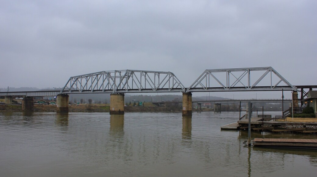 View of the CSX Railroad trestle over the Coosa River in Gadsden, Alabama. The bridge was built in 1888 in the swing bridge design to allow the center section to rotate and swing open which would allow steamboat traffic to pass on the river.