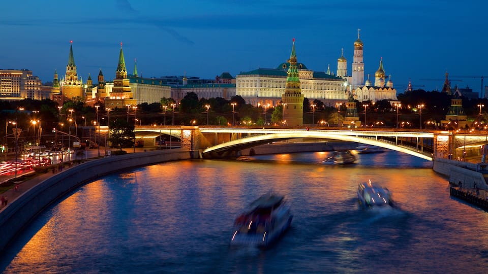 Moscow Kremlin featuring a city, night scenes and a river or creek