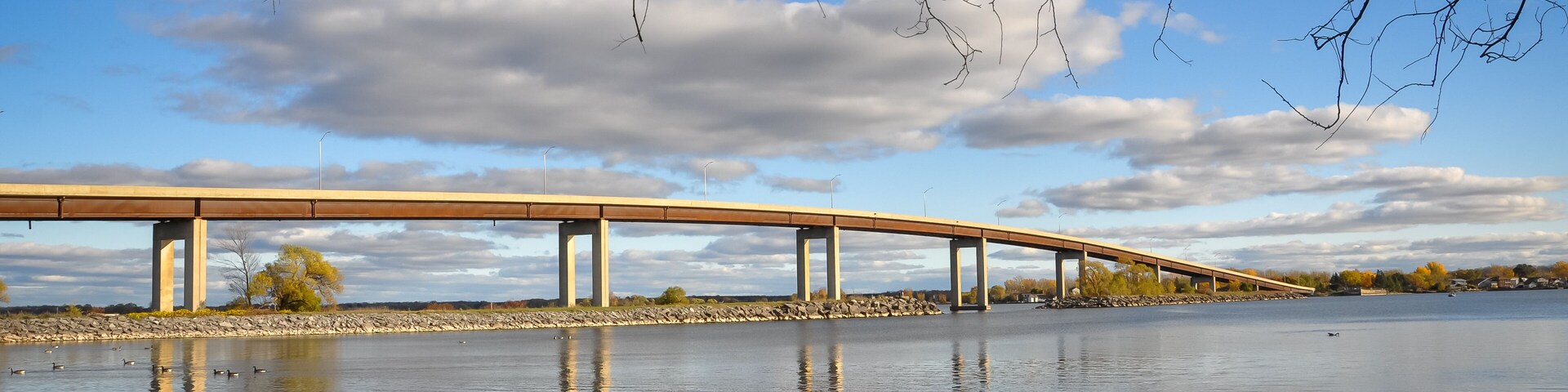 Bridge over the lake in cloudy day