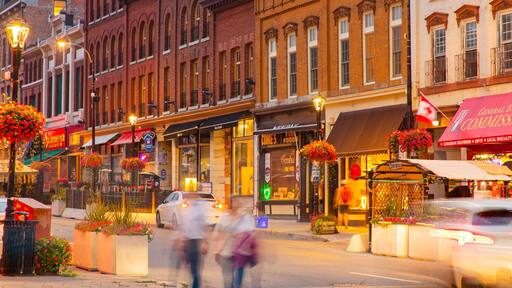 Kingston which includes a city, night scenes and street scenes