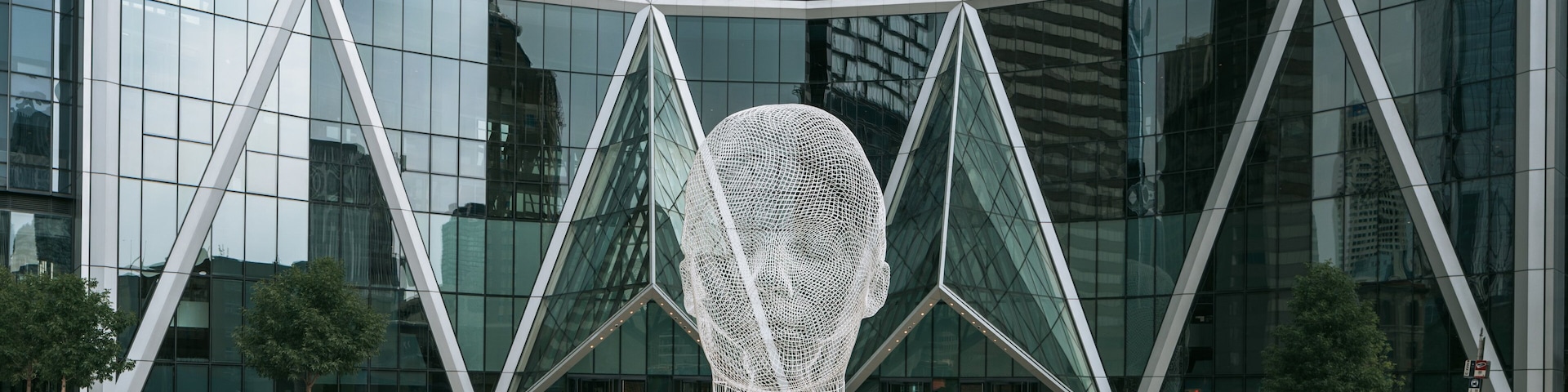 Wonderland Sculpture featuring outdoor art and a city