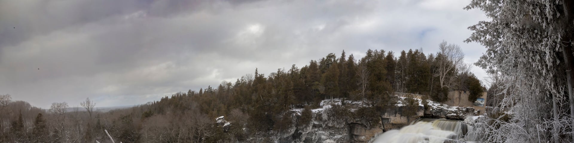 A panoramic view of Inglis Falls near Owen Sound, Ontario as it crashes its way down the rocks and through the surrounding forest.