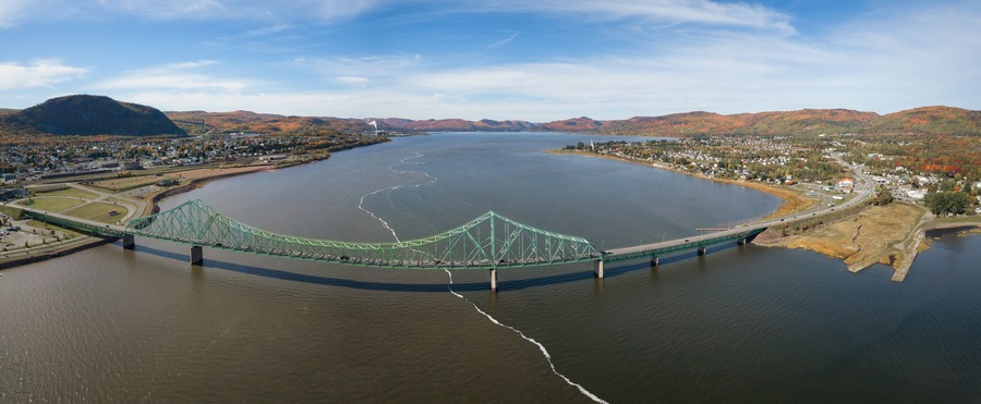 Aerial panoramic view of J.C. Van Horne Bridge that runs from Pointe-à-la-Croix, Quebec, to Campbellton, New Brunswick, Canada.
