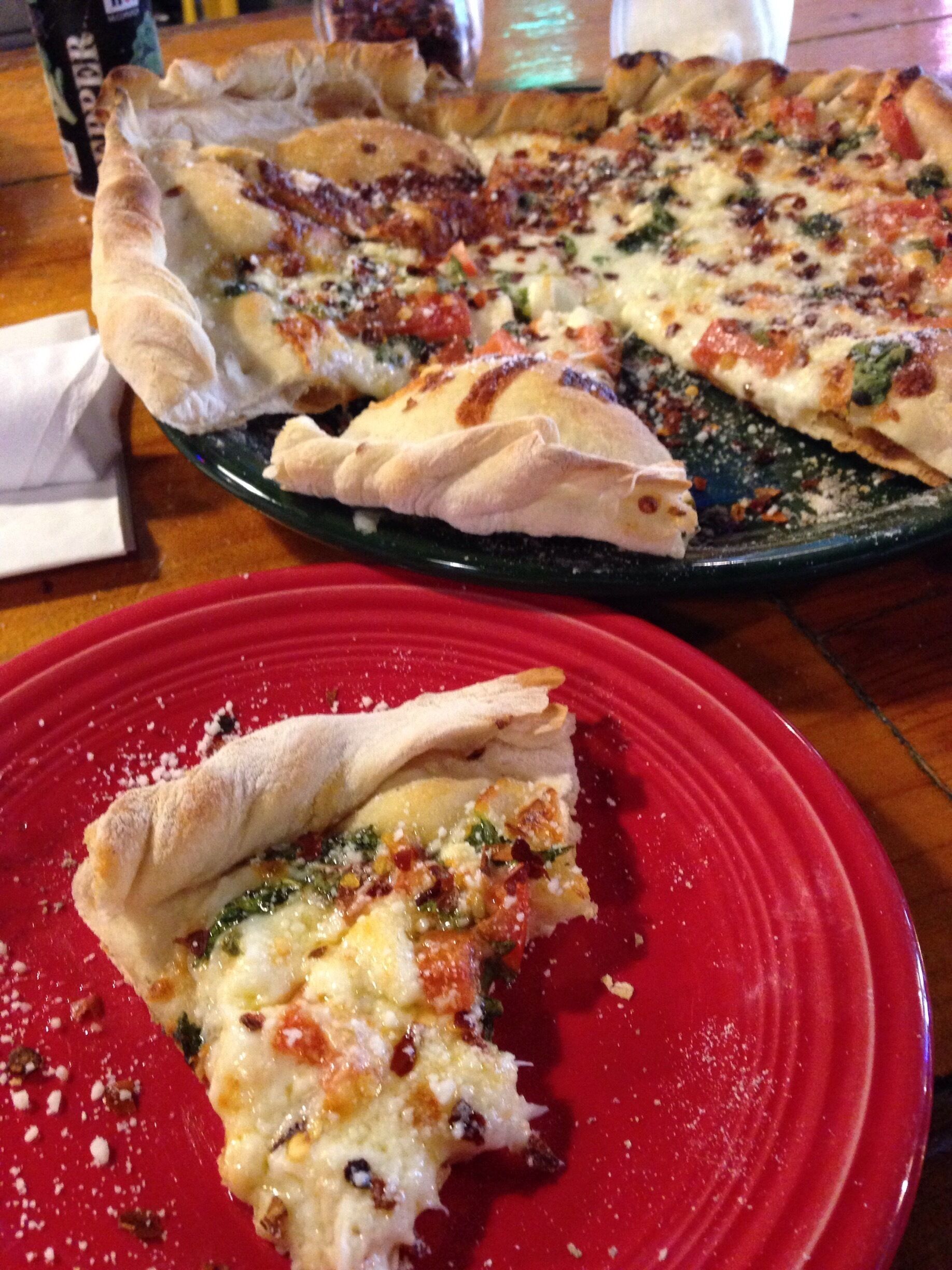 Amazing White Cheese Pizza. Locals place with outside patio view of the water too. 