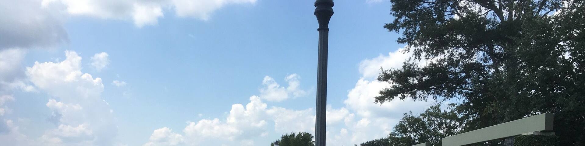 Relaxing spot with nearby restaurants and shops. The swings I guess are for the weary shopper