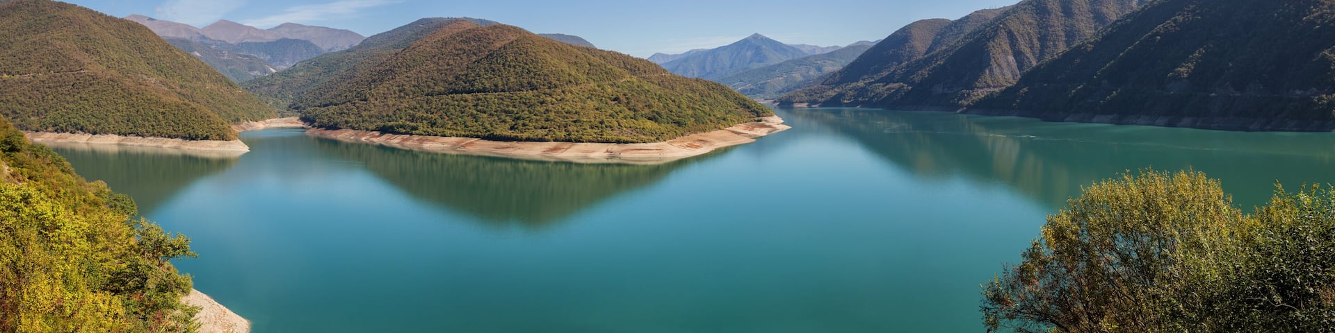 Panoramic view of Zhinvali reservoir on Aragvi River, Georgia. Scenic landscape in autumn sunny day