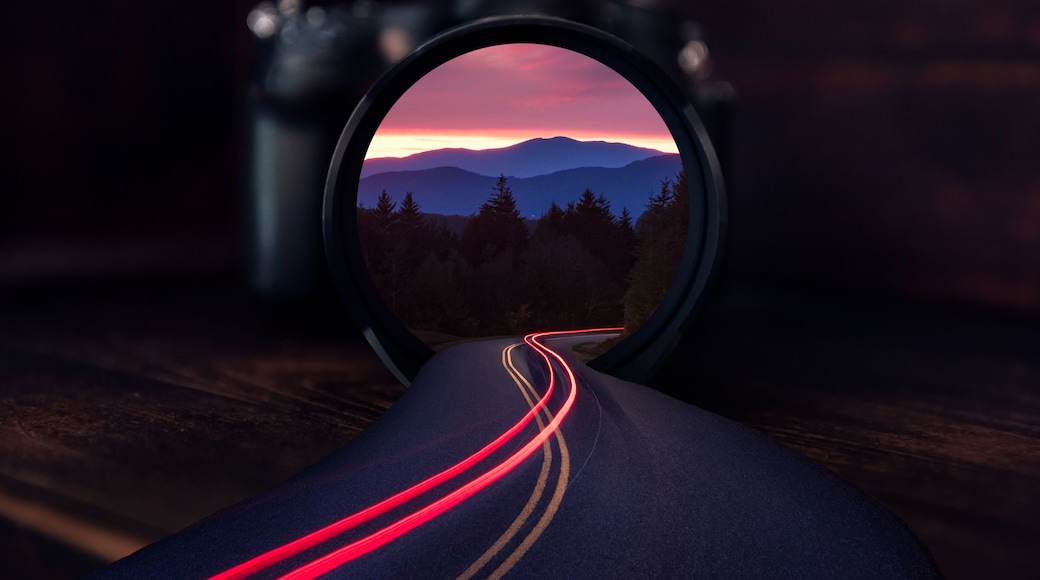 Scenic sunset, blue ridge mountains, reflection in camera lens