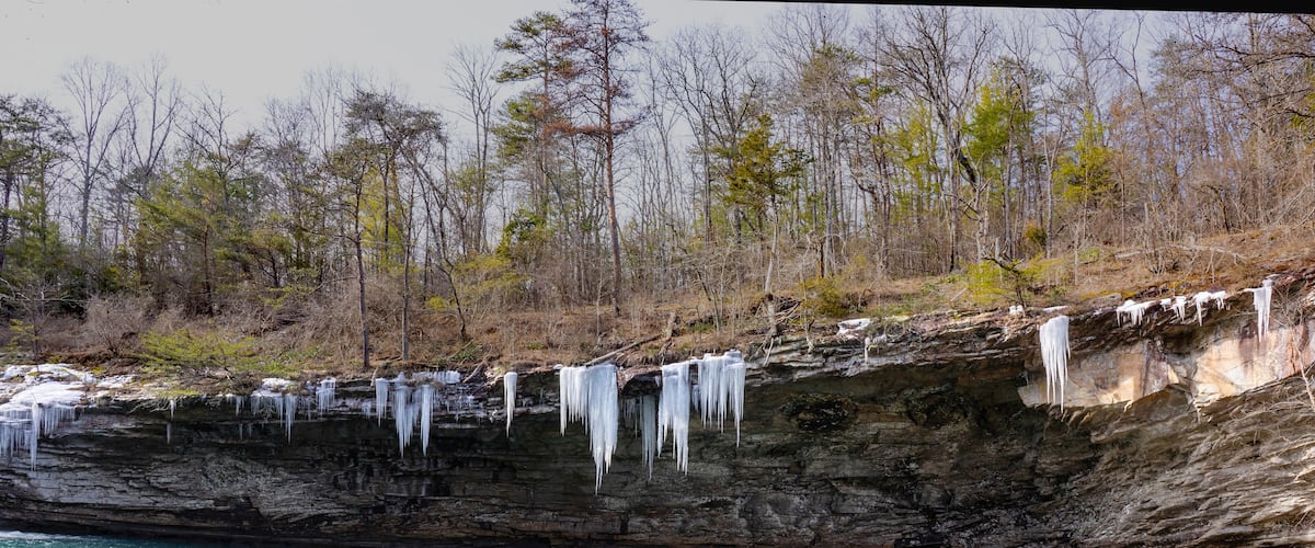 Lula Lake Land Trust, Lookout Mountain, Georgia. Icicles hang from the cliffs surrounding the beautiful aqua-blue water of Lula Lake, which is fed by Rock Creek.