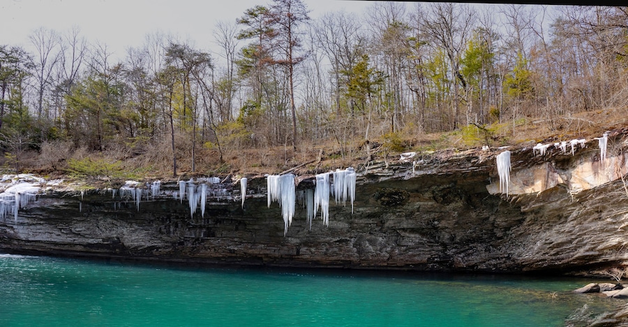 Lula Lake Land Trust, Lookout Mountain, Georgia. Icicles hang from the cliffs surrounding the beautiful aqua-blue water of Lula Lake, which is fed by Rock Creek.