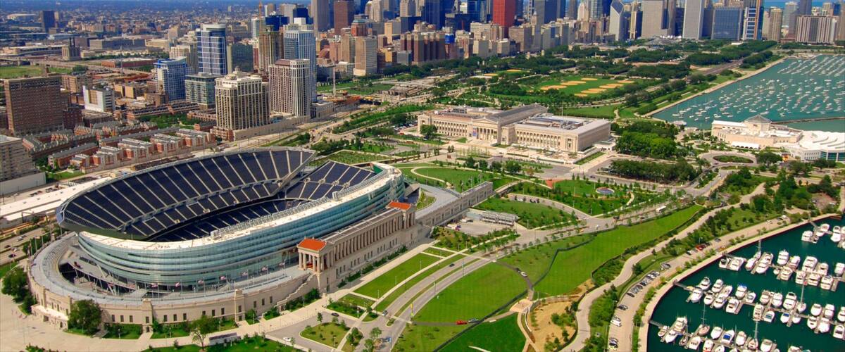 Soldier Field which includes a city, modern architecture and a skyscraper