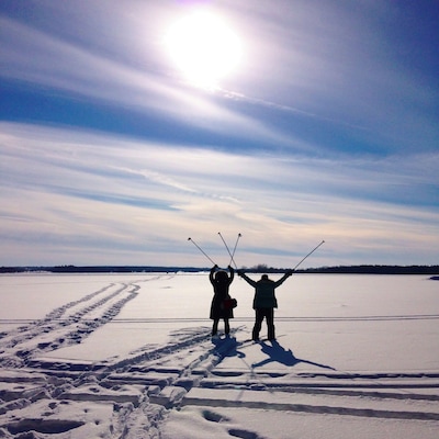 The winter sun, the sky, the frozen river beneath us. This is our home and native land. #canada #travel #snow