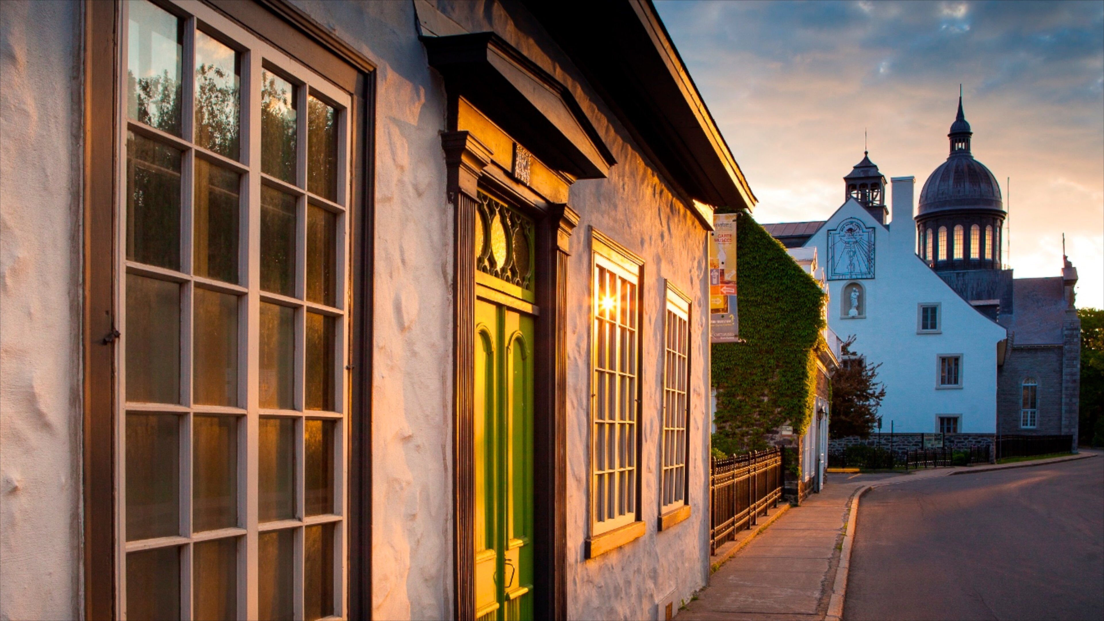 Trois-Rivieres featuring heritage architecture and a sunset