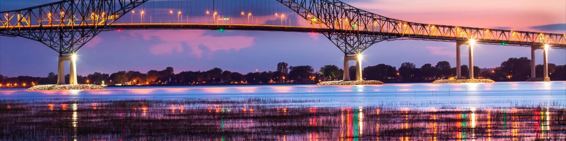 Trois-Rivieres showing a bridge and night scenes