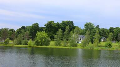 Landscape during summer time in Monteregie region of southern Quebec, Canada. Monteregie is known for its vineyards, orchards, maple trees, panoramas, and the Monteregian mountains.