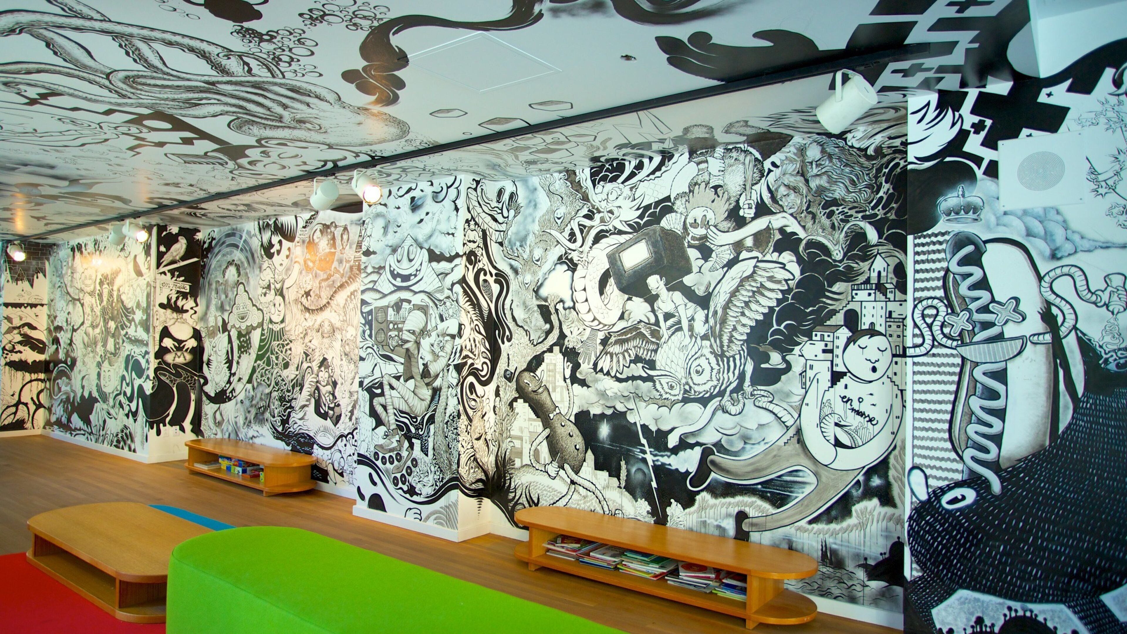 Downtown Montreal showing art, a city and interior views