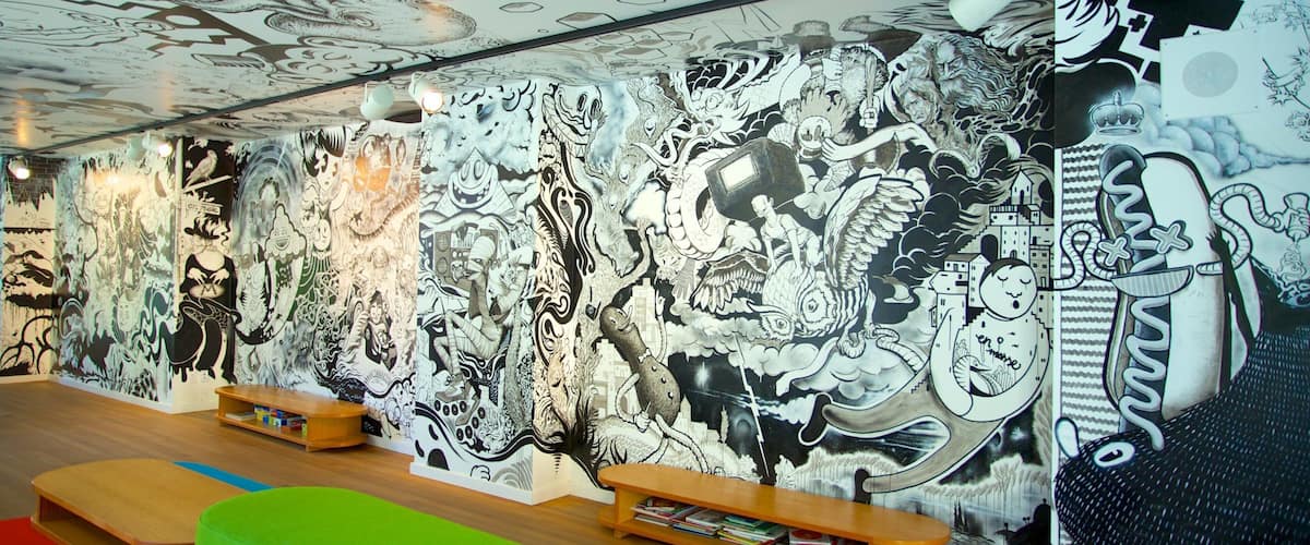 Downtown Montreal showing art, a city and interior views